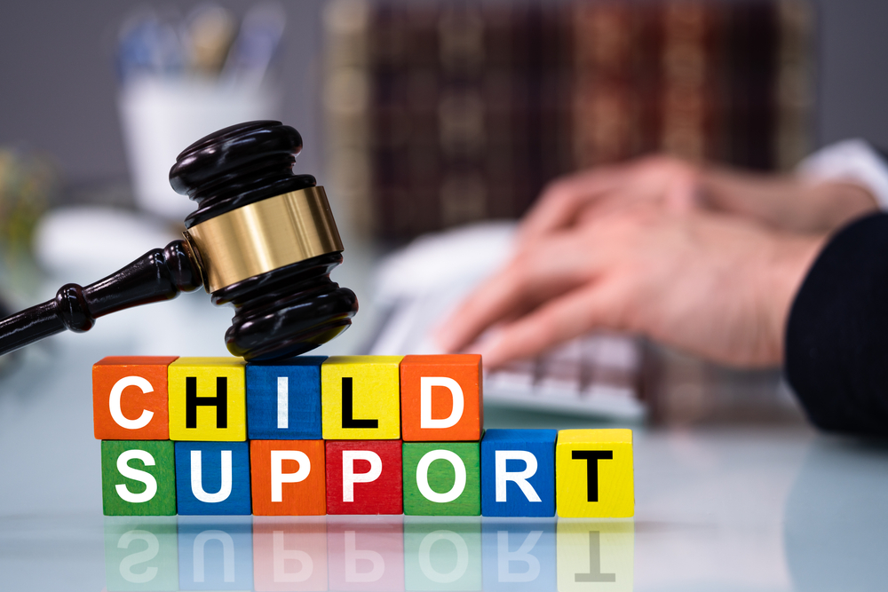 court gavel on blocks spelling out child support